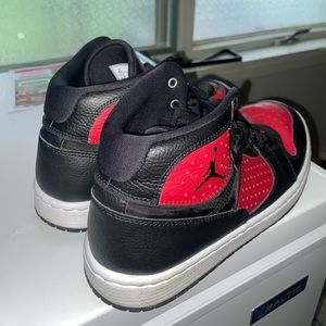 Black and red Jordan’s size 8.5